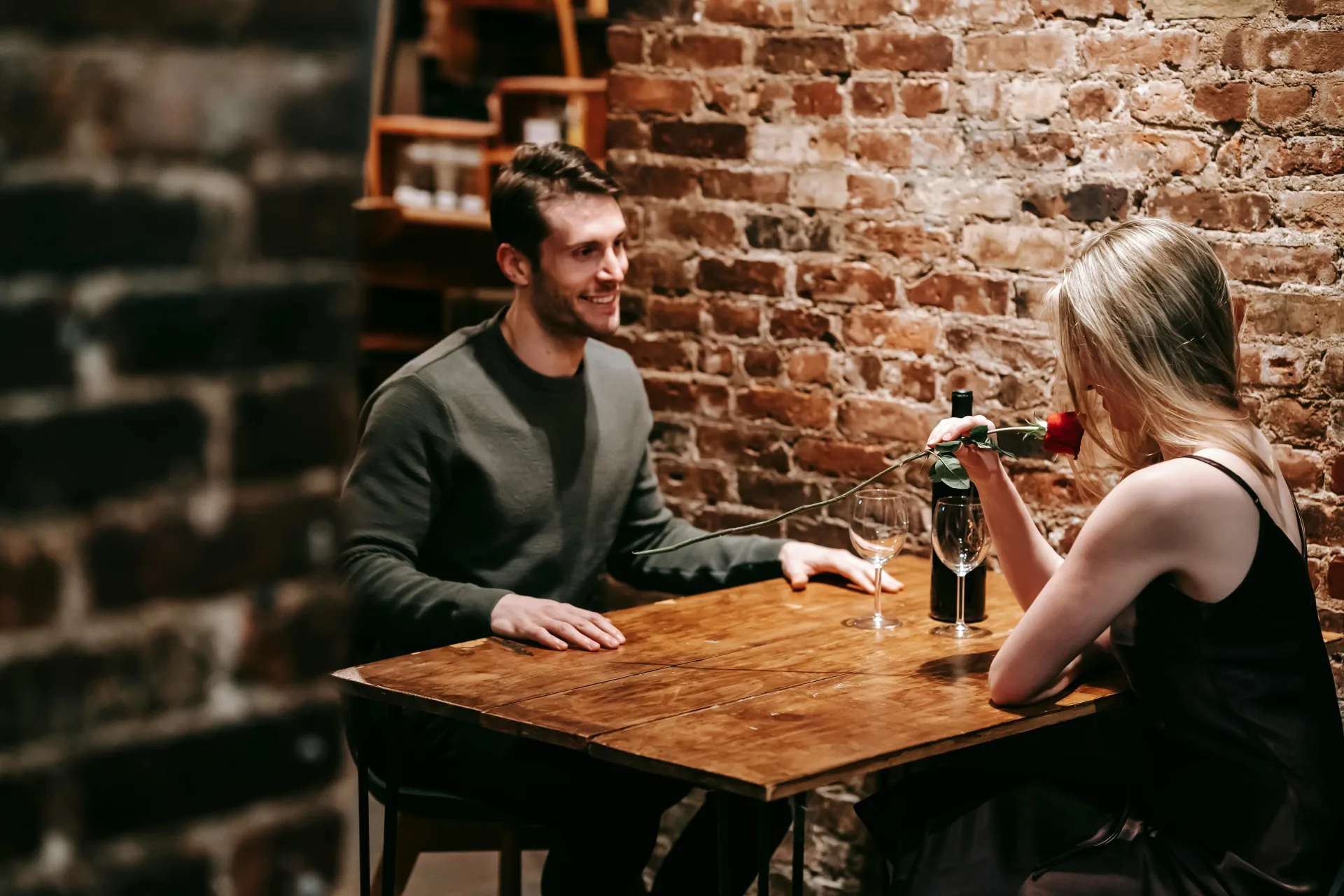 Speed dating event in progress — singles meeting face-to-face at a structured dating night in a US city